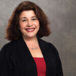 Carol C Headshot Grey BG